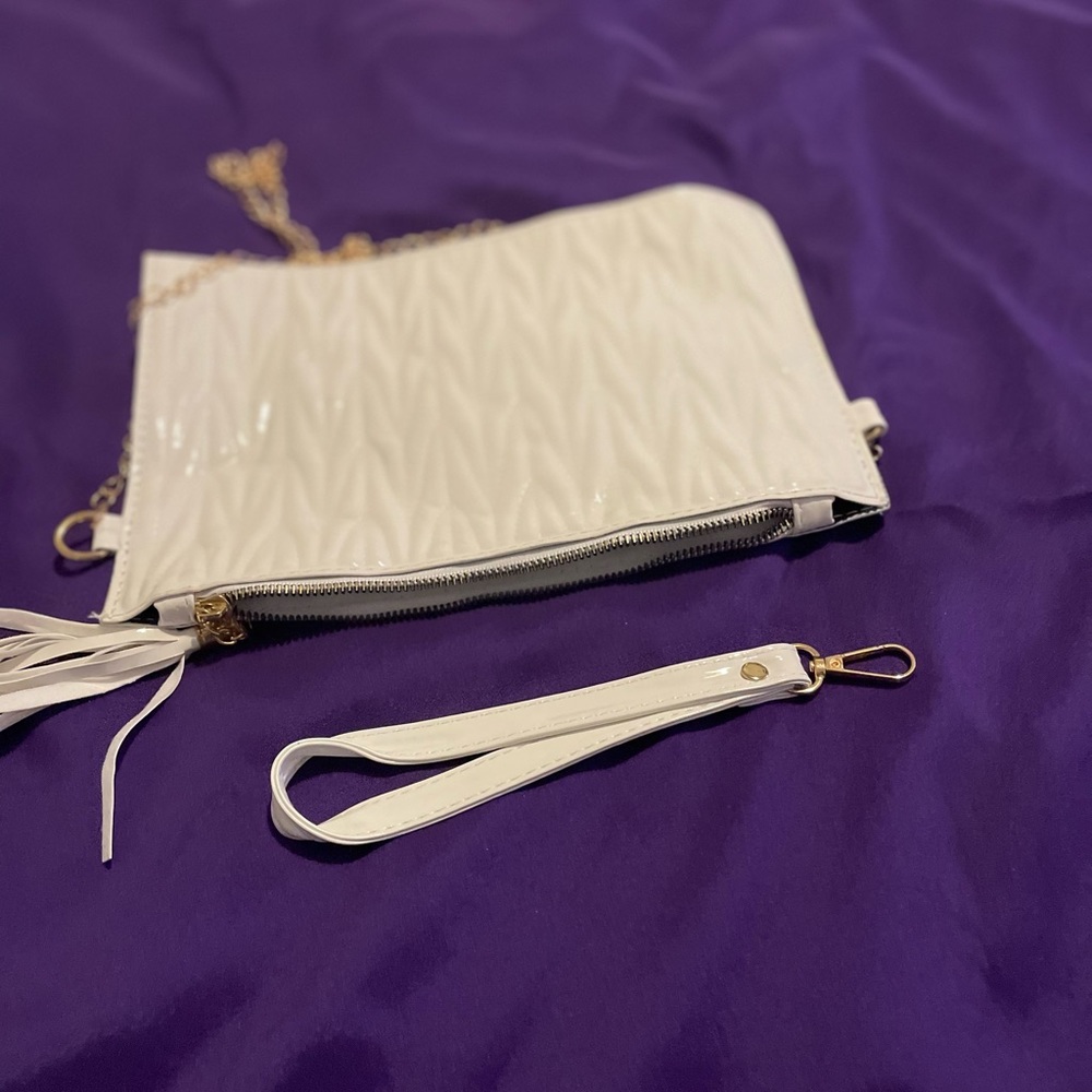 White and gold bag with extra handle to wear as a clutch